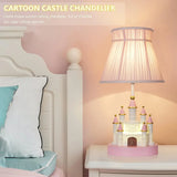 Cartoon children's table. Light pink bedside table. Princess-style cute castle-shaped resin material lamp for girls' bedroom and living room, with fabric shade cover.